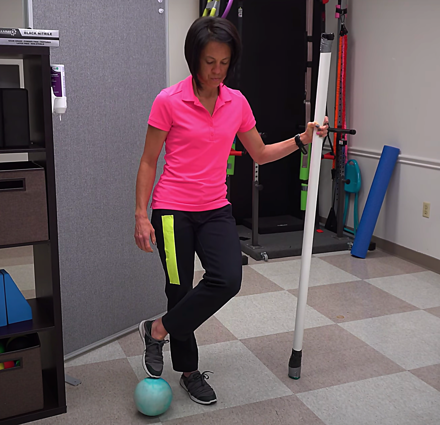 advanced balance activity with a medicine ball and half moon pattern