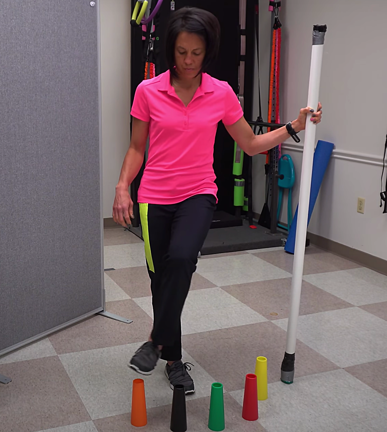 advanced walking exercise with stacking cones and crossing midline
