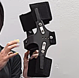 Image of Tara holding a Swedish Knee Cage