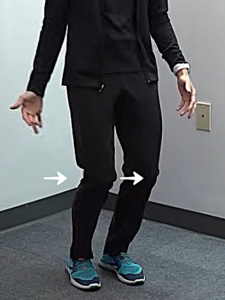 Image of Tara Tobias standing with both her knees bent .