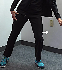 Image of Tara Tobias, waist down, demonstrating an abducted stance with her left leg positioned out to the side.